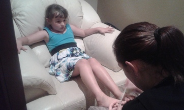 Getting her toe nails painted :)
